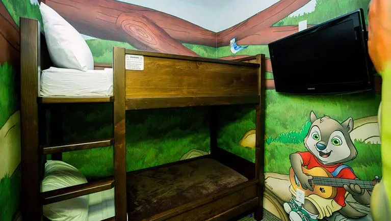 The bunk beds inside the den in the Accessible Wolf Den Suite